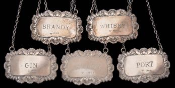 Set of five Elizabeth II silver decanter labels, maker A Chick & Sons Ltd.