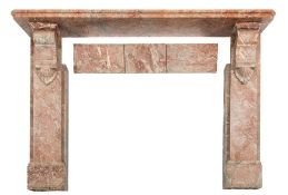 A 19th Century rouge variegated marble fireplace:, the shelf with cut corners,
