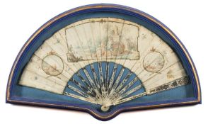 An early 19th century English ivory fan: the paper leaf decorated with a central cartouche