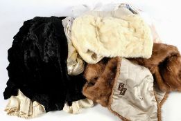 An early 20th century black velvet and cream silk lined cape by Maison Marocain, Shanghai:,