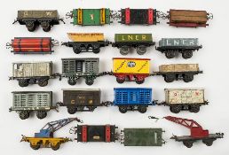 Hornby O gauge a group of goods wagons:, two crane trucks, a rotary tipping wagon, GWR goods wagon,
