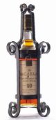A bottle of Macallan 10 year old single malt whisky:, in a wrought iron cage with padlock clasp.