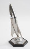 An Art Deco chrome Rocket table lighter by Planet:,