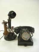 An early 20th century Post Office No 2 telephone:, in black with brown ear piece:,