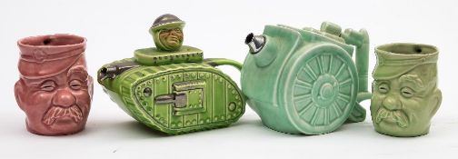 A Saddler 'Churchill' tank teapot:, in green with silver lustre highlights,