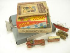 A German tinplate clockwork tank:, together with a tinplate racing car,