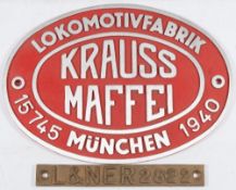 A reproduction German worksplate for 'Krauss Maffei' together with a reproduction brass LNER number