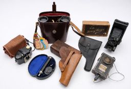 A black leather pistol holster:, together with a brown leather pistol holder,