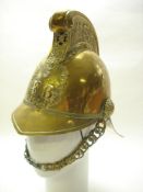A late 19th/early 20th century brass Merryweather pattern fireman's helmet:,