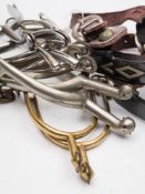 A group of eight pairs of various spurs:,