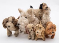 A group of six mid 20th century plush dogs:, various makers including a wire haired Dachshund ,