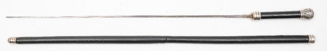 A white mounted sword stick:,