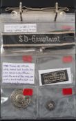A collection of Third Rich insignia:,