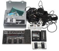 A Zoom GFX-5 Guitar effects processor:,