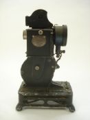 An early 20th century 'Pathescope' 9 mm film projector:,