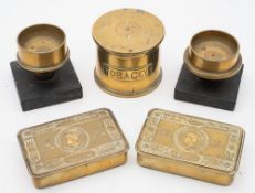 A WWI trench art tobacco tin made from two 18lb shell cases dated 1915: together with a pair of 6lb