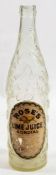 An early 20th century oversized advertising shop display bottle for Roses Lime Juice Cordial:,