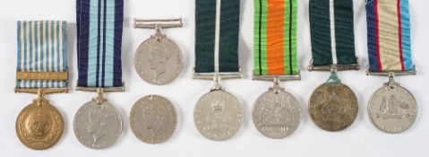 A group of seven George VI service medals:, two War Medals, a Defence Medal,