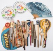 A collection of twenty four early 20th century French advertising fans:, for alcohol,