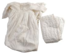 A Victorian child's chair, christening gown and undergarment.