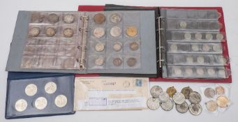 A collection of modern British and world coins: contained in albums, box and files.