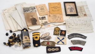 A collection of various military and Royal Navy button and shoulder badges:, including a pair of R.