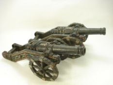 A pair of cast iron decorative cannons:,