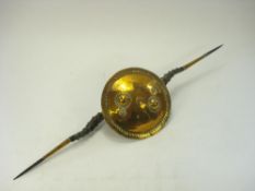 A 19th century Indian parrying shield (Madu):,