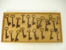 A collection of twenty one various late 18th/early19th century keys:,