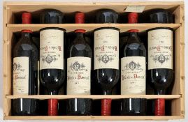 A case of twelve bottles of Lalande De Pomerol 2001: Christian Moueix.