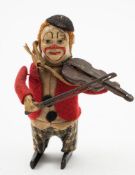 Schuco (Germany) a clockwork clown violinist:, black felt cap, painted face,