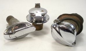 A group of three vintage chrome plated filler caps:, various models.