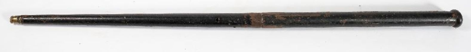 An early 20th century air cane gun: of plain form with brass barrel, 95cm long,