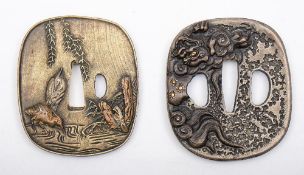Two reproduction Japanese tsubas:, both in the traditional style, one with Herons and foliage,
