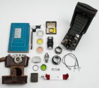 A Leica Model III camera :,serial number 201914, circa 1936:, black body with chrome fixtures,