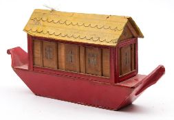 An early 20th century wooden Noah's Ark:, with yellow roof and red painted hull,