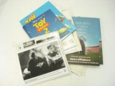 A collection of lobby cards and film promotional.