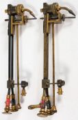 A matched pair of lacquered brass lime illuments for a biunial magic lantern:, unsigned,