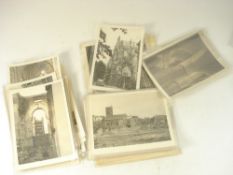 A collection of photographs of Exeter Cathedral and its environs showing WWII bomb damage:,