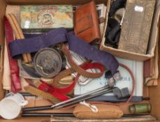 A collection of various militaria:, including cap and shoulder badges,