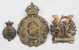A Tyneside Scottish Regiment cap badge:,