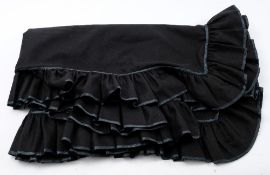 A mid 20th century French handmade black woollen shawl:, with frilled edge and black lace trim..