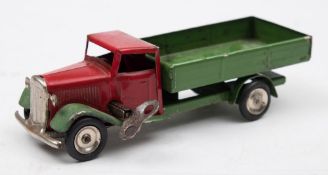 Tri-ang Minic clockwork delivery lorry:, red cab with green chassis.