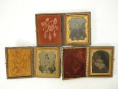A group of three cased ambrotypes of a woman and two children, late 19th century:,