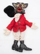 A Pelham style puppet of an anthropomorphic fox wearing hunting pinks:,
