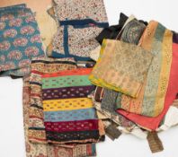 A collection of late 19th and early 20th century South East Asian embroidered panels:,