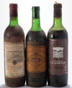 A bottle of Chateau La Tour Vedrines 1975,
