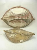 Two African hand painted wood and hide shields:, (a/f) (2).