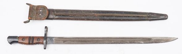 An American WWI period Remington pattern bayonet:, the single edged fullered blade dated 1917,