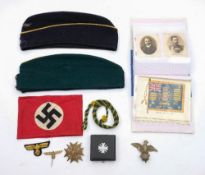 A German Third Reich NSDAP armband:, together with a Bronze Spanish Cross, an eagle tie pin,